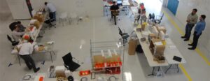 an overhead view of employees working together in a lab