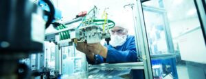 an employee working on a machine