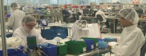 employees working at a manufacturing plant