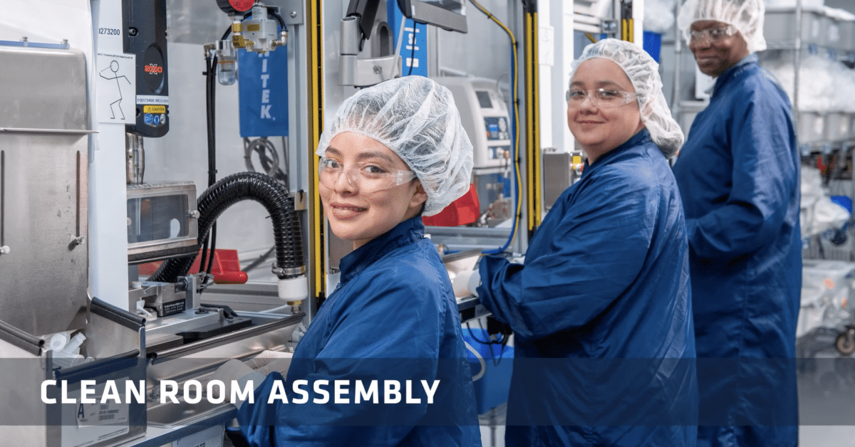 Viant employees working in the clean room assembly