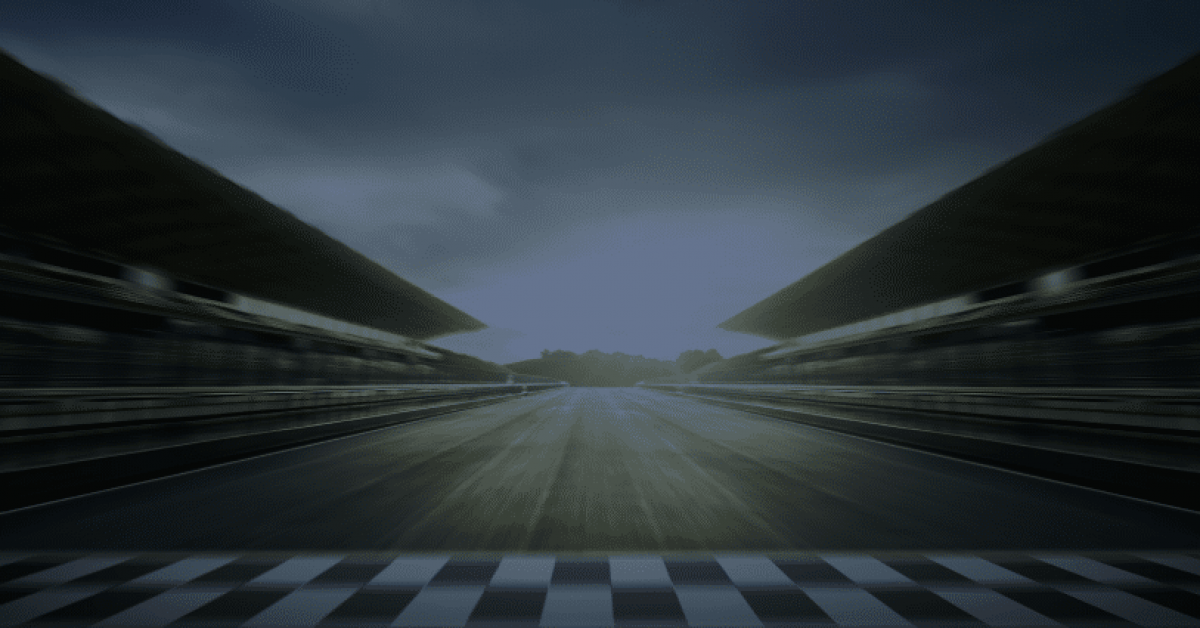 a dark photo of the racetrack finishline