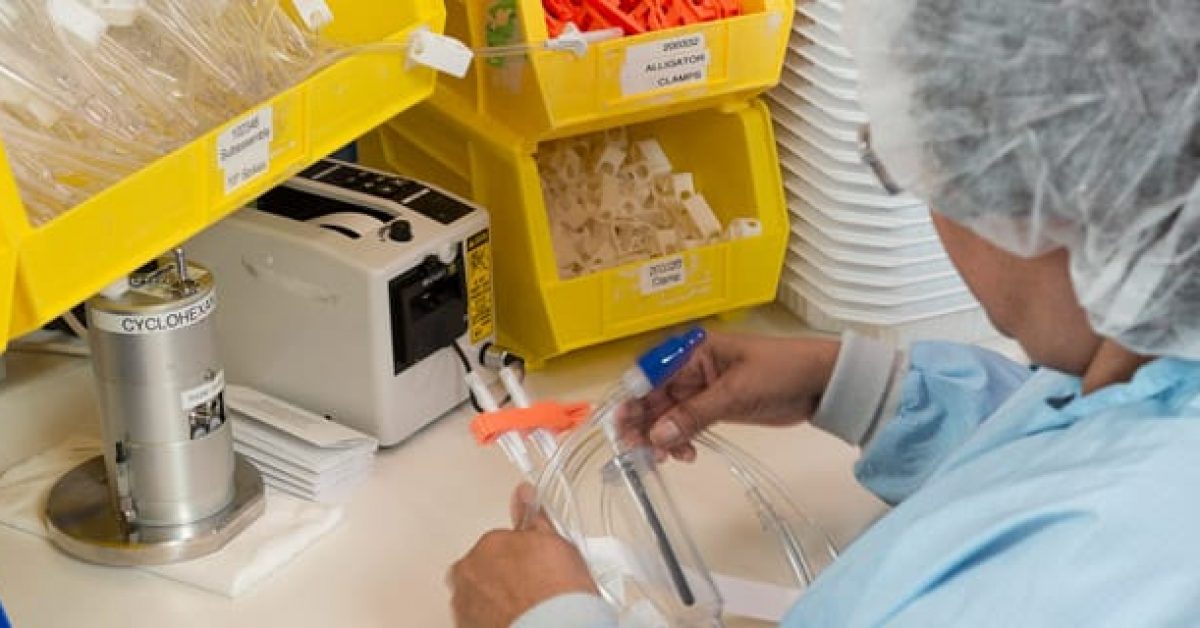 an employee working with tubbing