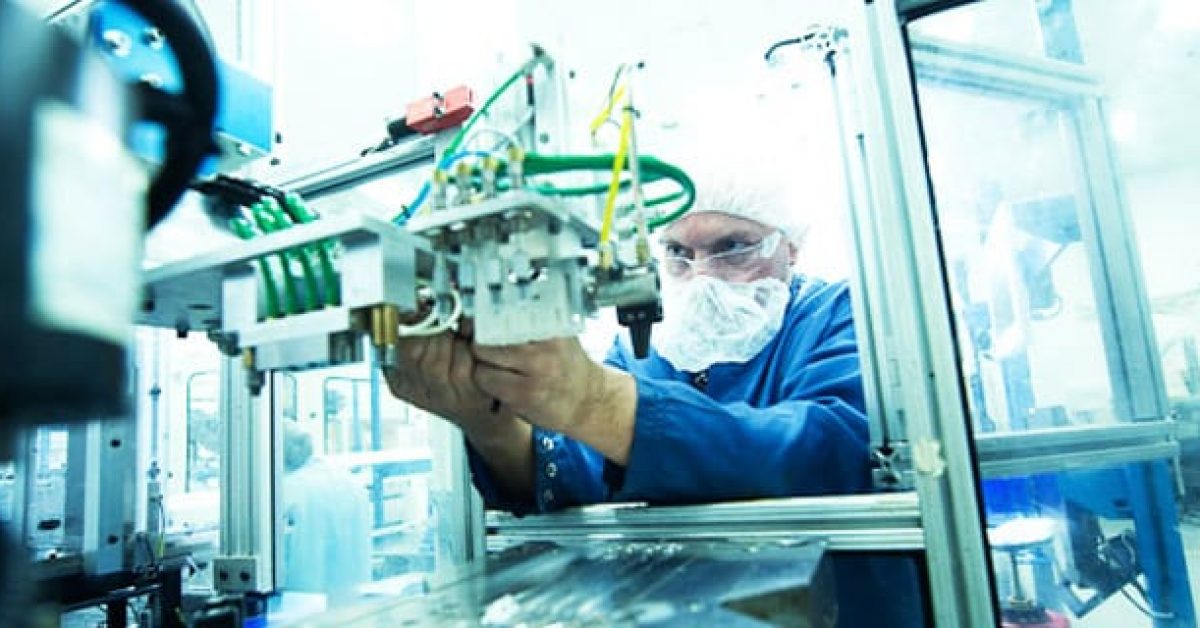 an employee working on a machine