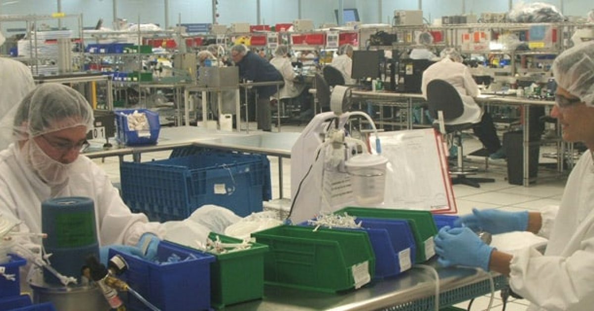employees working at a manufacturing plant