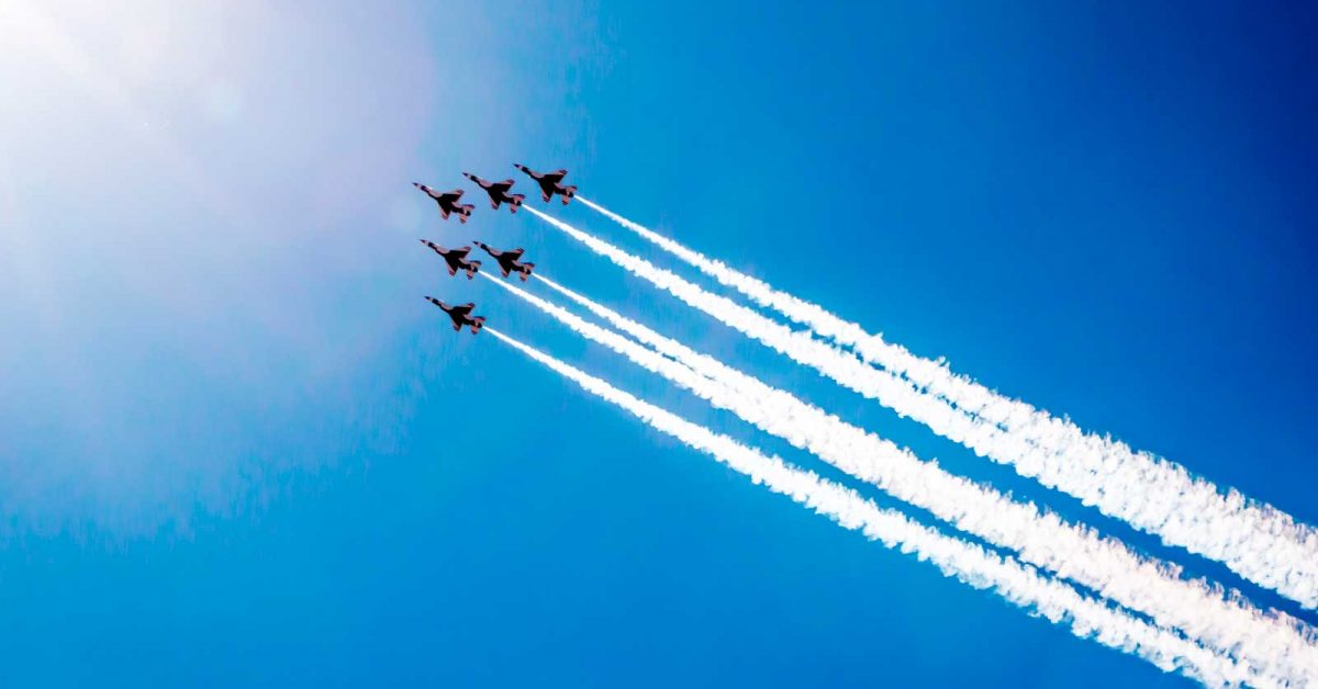 6 planes flying in the sky